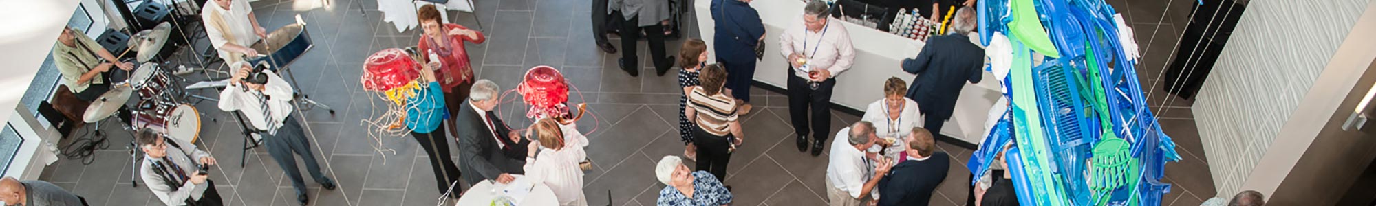 overview shot of people talking at a party