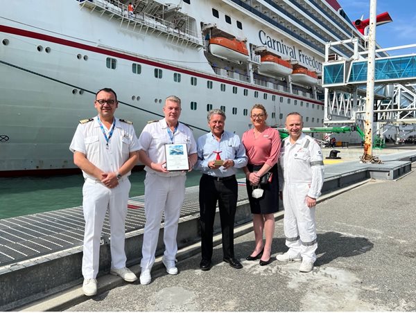 (L-R) Rene Jewell, Carnival Freedom Hotel Director, Carnival Freedom Capt. Josip Mladina, Capt. John Murray, Canaveral Port Authority CEO, Rachel Green, Carnival HR Director, Agostino Ceserale, Carnival Freedom Chief Engineer dockside at Cruise Terminal 6