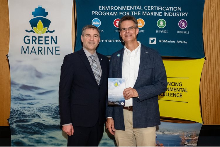 Bob Musser (R), Senior Director, Environmental receives recertification from David Bolduc (L), President and CEO of Green Marine